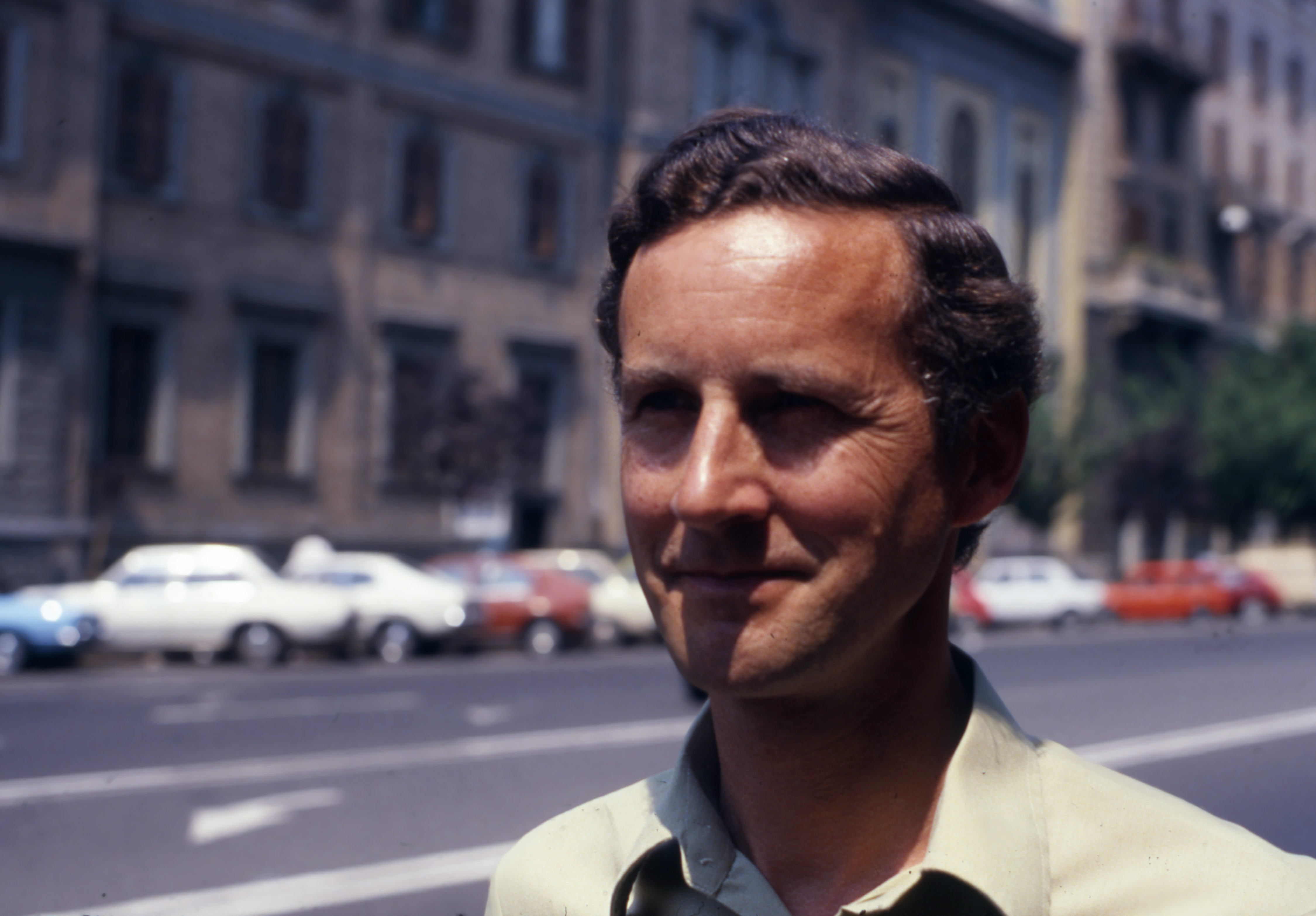 David Willey, who died July 11, 2026, served as a BBC correspondent in Rome starting in 1972. He is seen here standing on a street in 1980. | Credit: Photo courtesy of BBC
