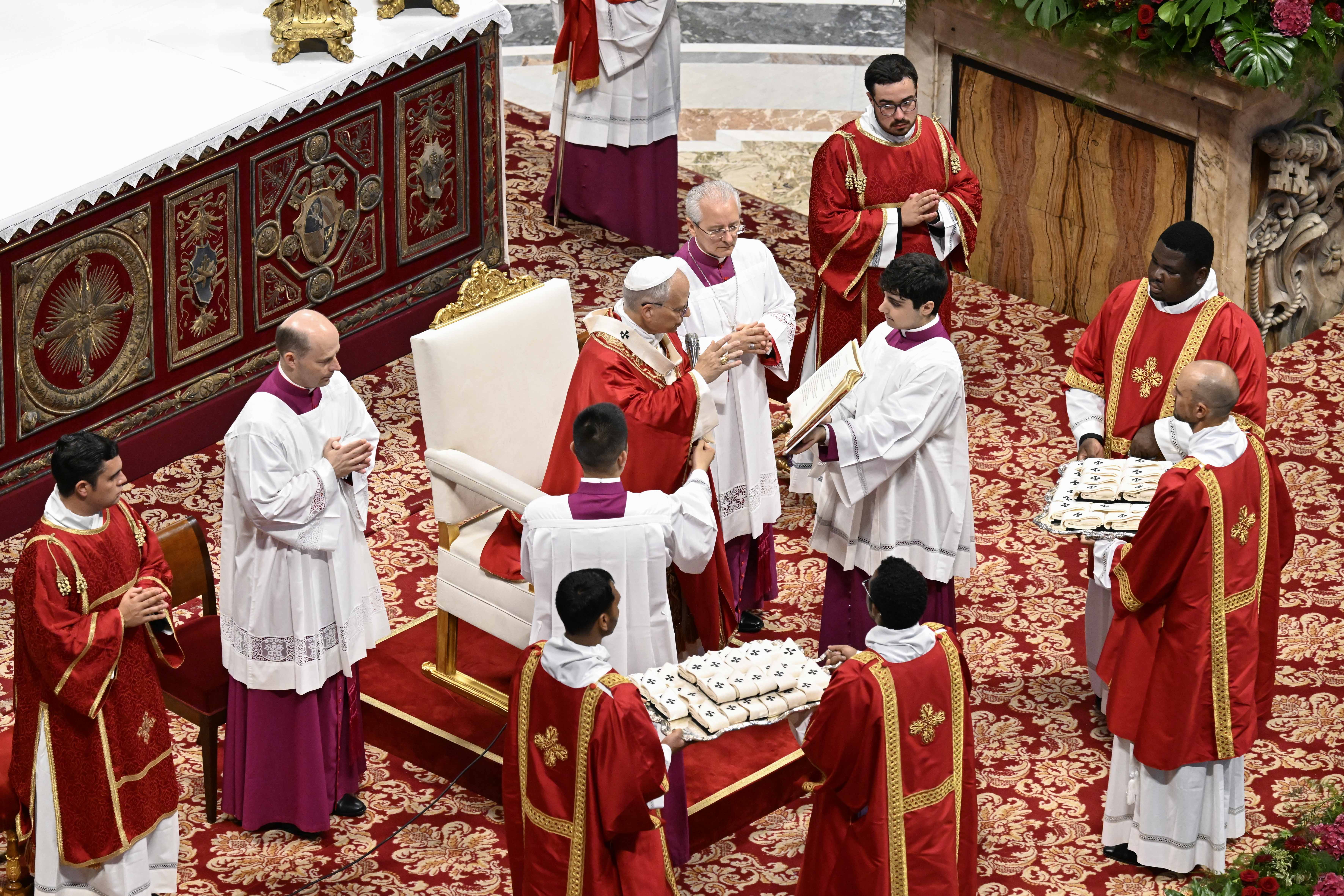 Pope Leo XIV prepares to bless the pallia before bestowing them on new metropolitan archbishops in a ceremony in St. Peterʼs Basilica on June 29, 2025. | Credit: Vatican Media