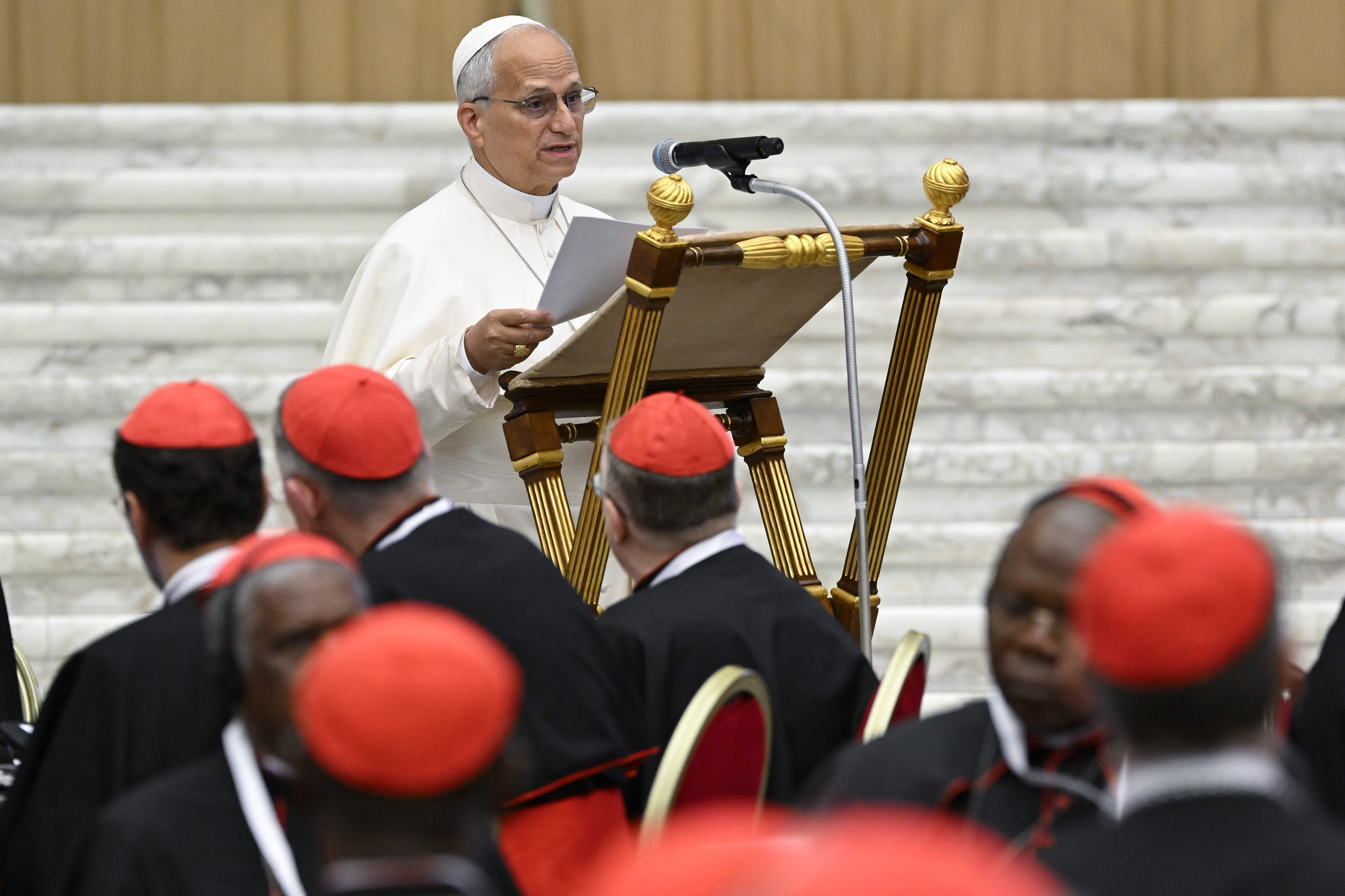 Pope Leo XIV addresses 178 cardinals on the first of two days of discussions for the second extraordinary consistory of cardinals, held in the Vaticanʼs Paul VI Hall on June 26, 2026. | Credit: Vatican Media