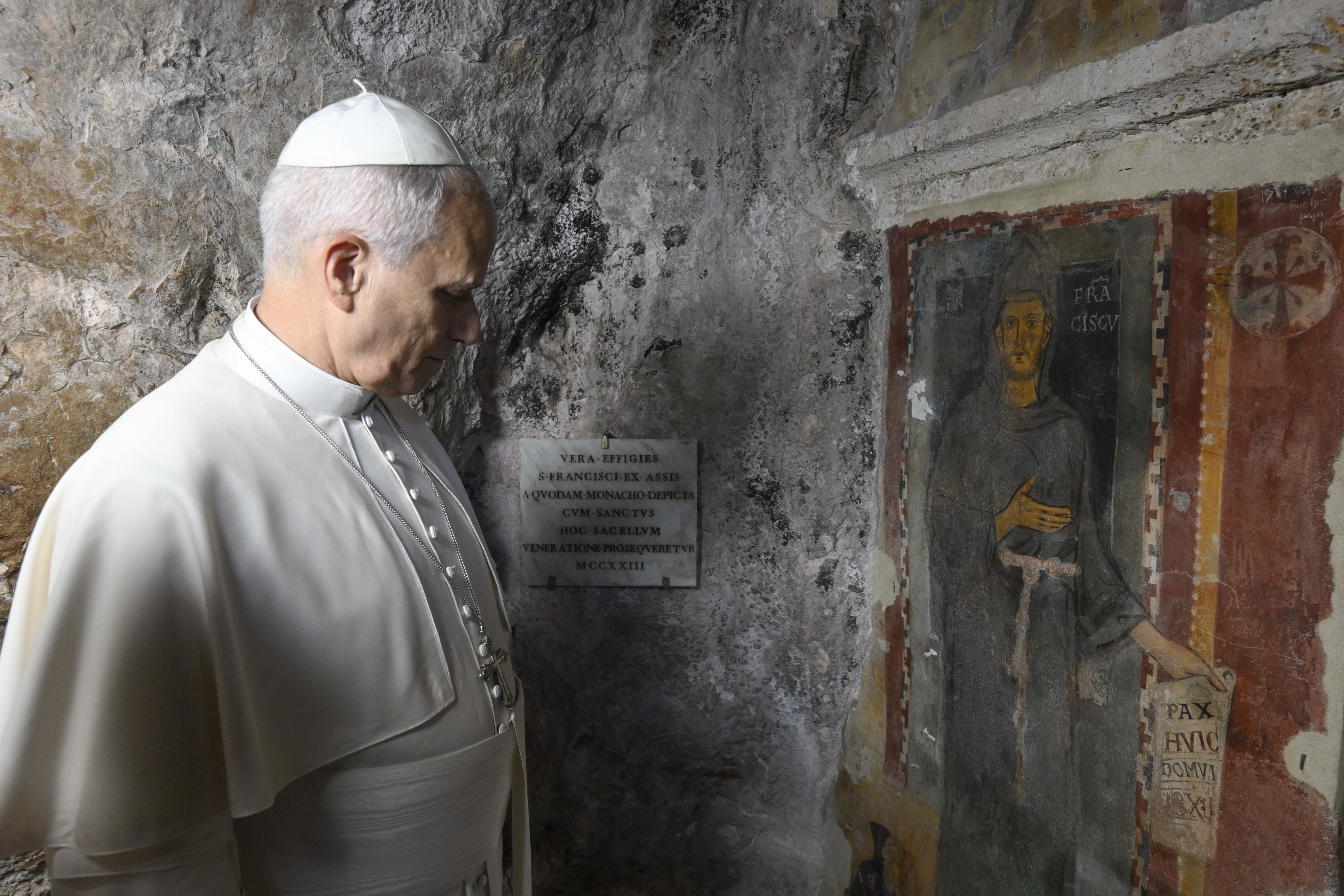 Pope Leo XIV stands before the oldest-known fresco of St. Francis of Assisi at St. Benedict Abbey in Subiaco, Italy, on July 22, 2026. | Credit: Vatican Media
