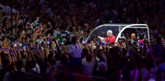 Thousands of young French Catholics converge on soccer stadium for prayer with Pope Leo